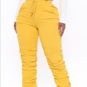 Fashion nova mustard stacked pants.